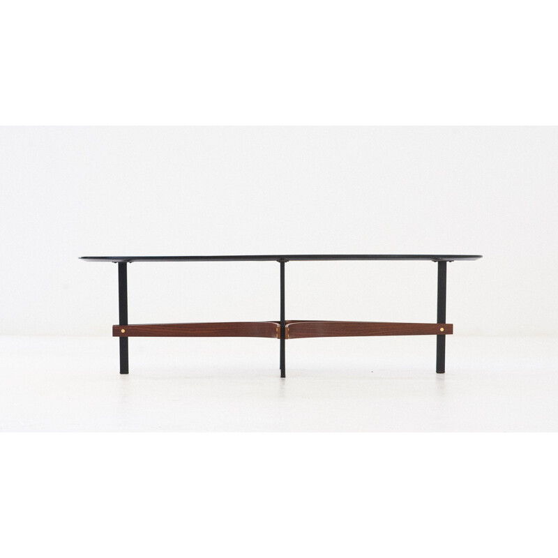 Large Italian ellipse coffee table in iron and rosewood - 1950s