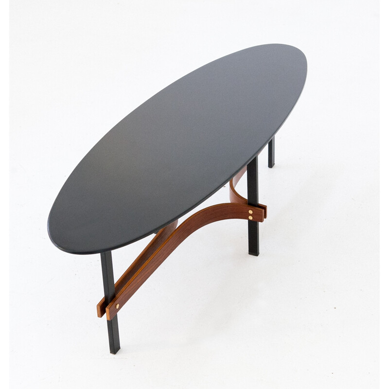 Large Italian ellipse coffee table in iron and rosewood - 1950s