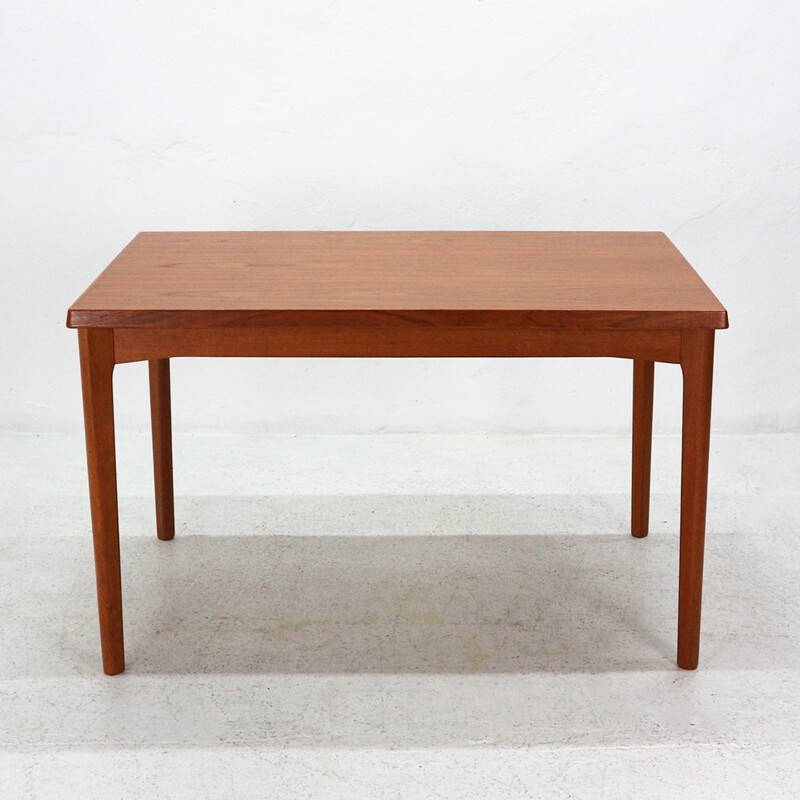 Extendible teak dining table by Henning Kjaernulf - 1960s