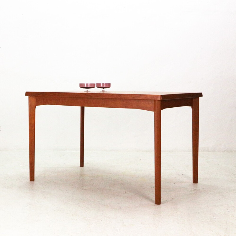 Extendible teak dining table by Henning Kjaernulf - 1960s