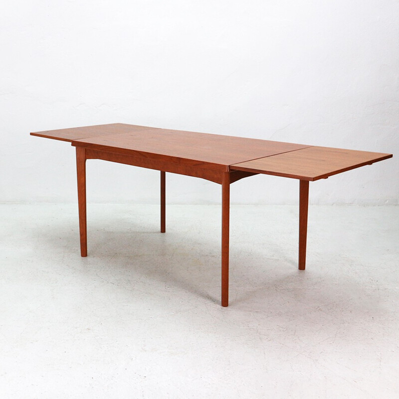 Extendible teak dining table by Henning Kjaernulf - 1960s