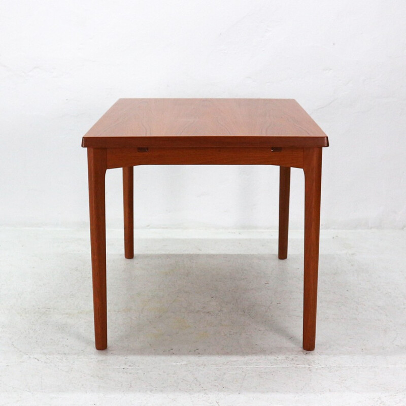 Extendible teak dining table by Henning Kjaernulf - 1960s