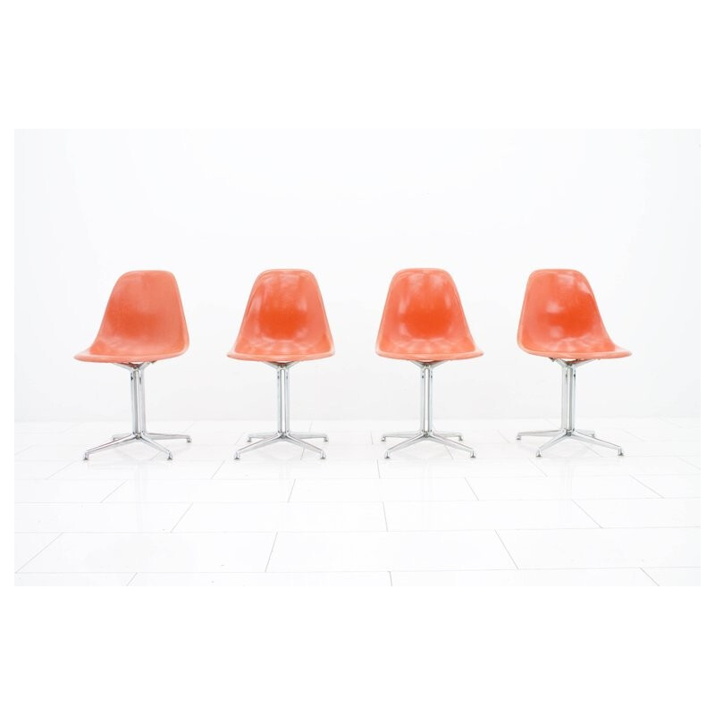 Set of 4 fiberglass side chairs with La Fonda Base by Charles & Ray Eames - 1960s