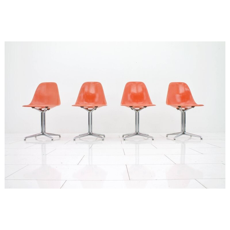 Set of 4 fiberglass side chairs with La Fonda Base by Charles & Ray Eames - 1960s