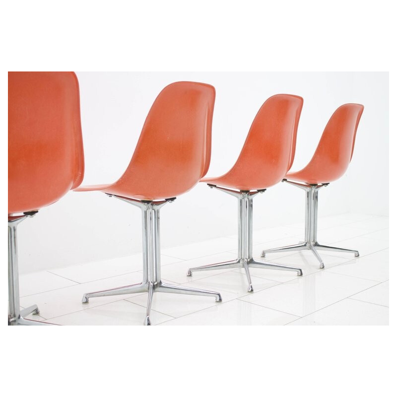Set of 4 fiberglass side chairs with La Fonda Base by Charles & Ray Eames - 1960s