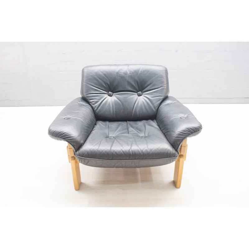 Large fauteuil vintage en cuir marron foncé - 1960