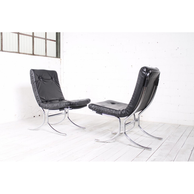 Black leatherette low chair with steel legs - 1970s