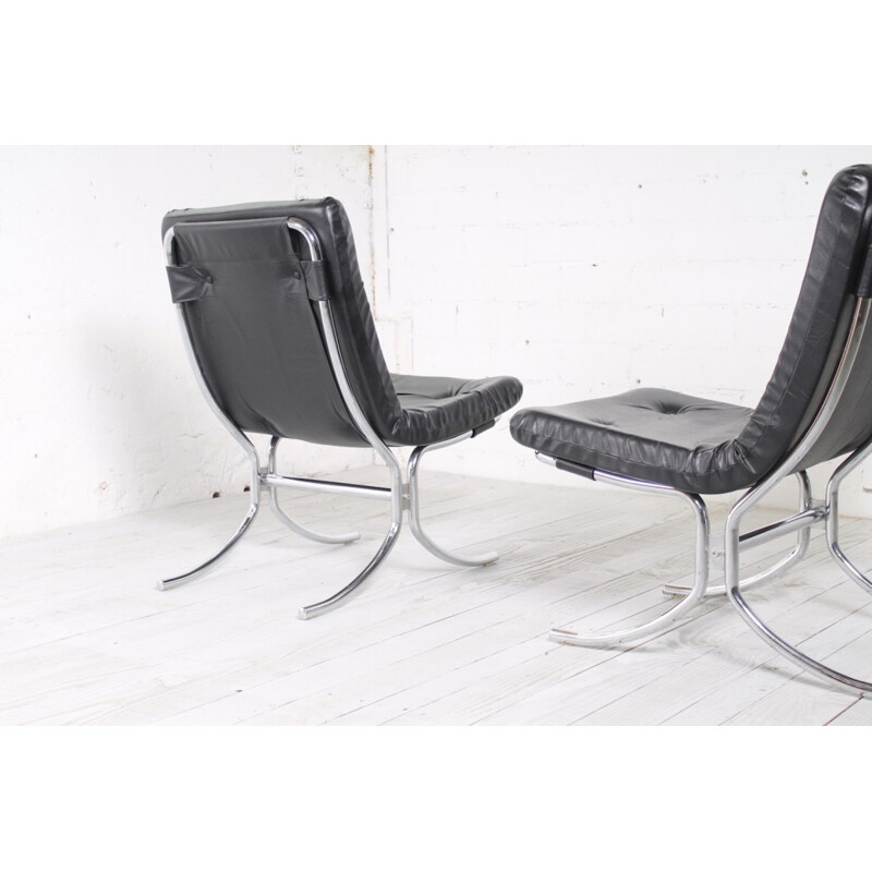 Black leatherette low chair with steel legs - 1970s