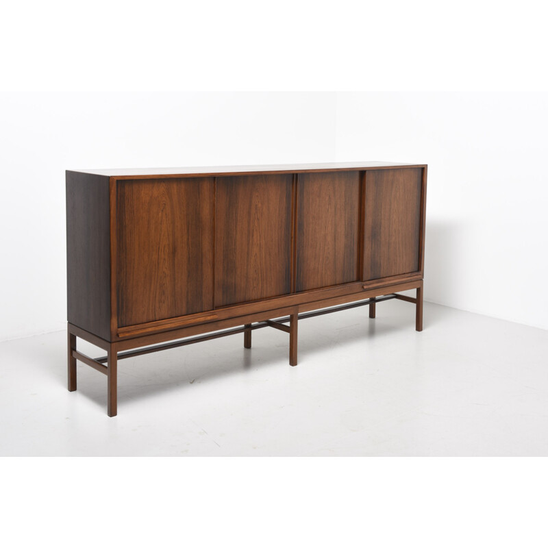 Rosewood highboard with 4 sliding doors by Kurt Ostervig for KP Mobler -  1950s