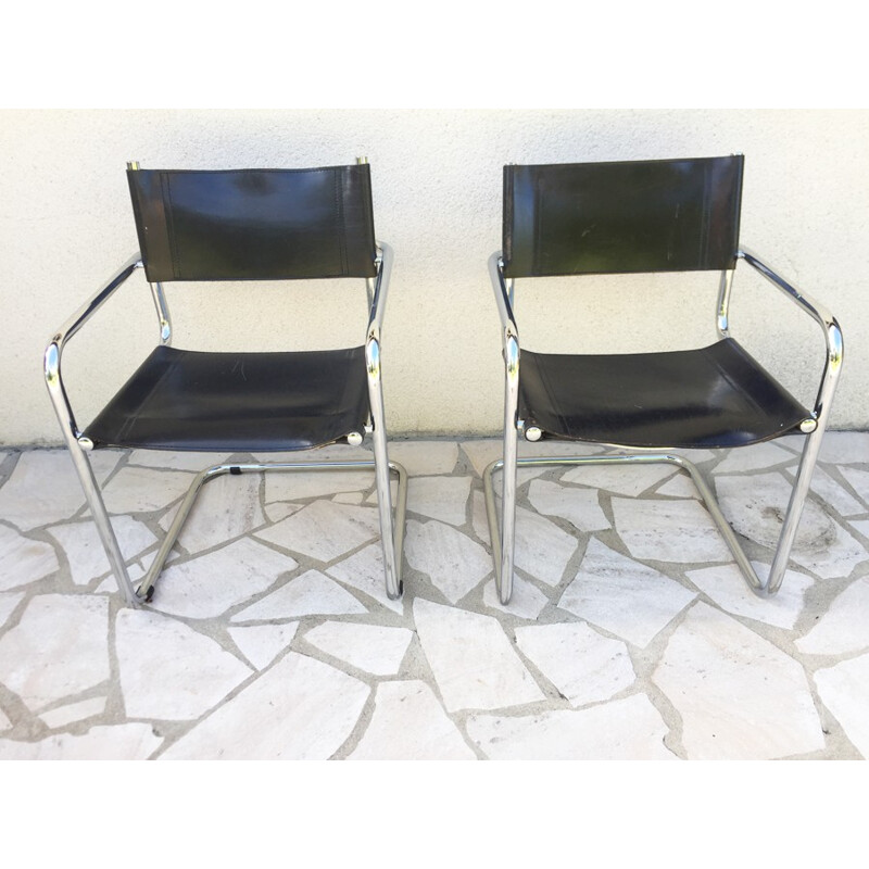 Pair of vintage armchairs in black leather and chrome - 1970s
