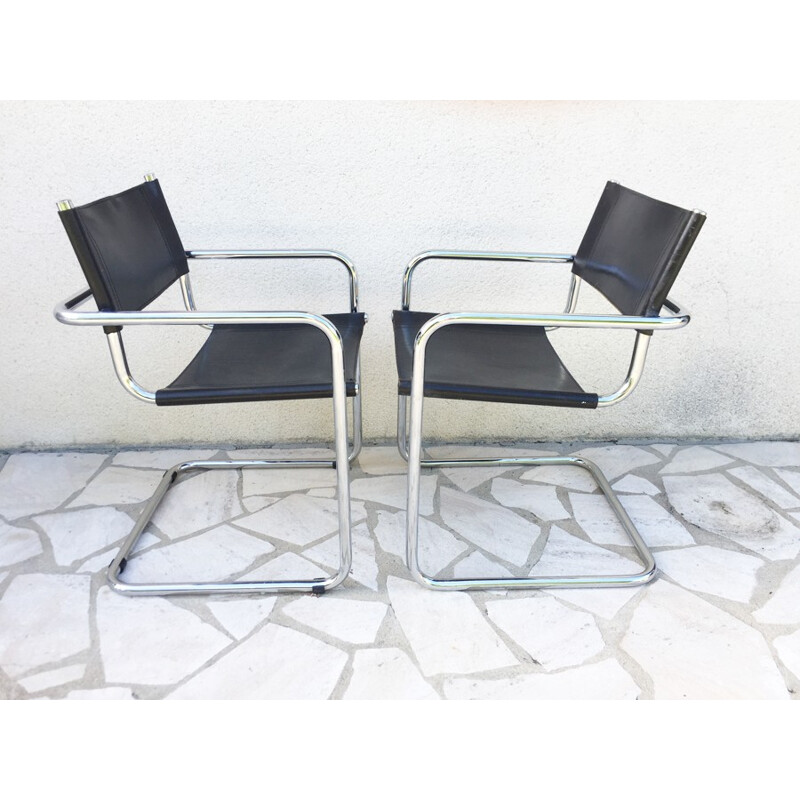 Pair of vintage armchairs in black leather and chrome - 1970s