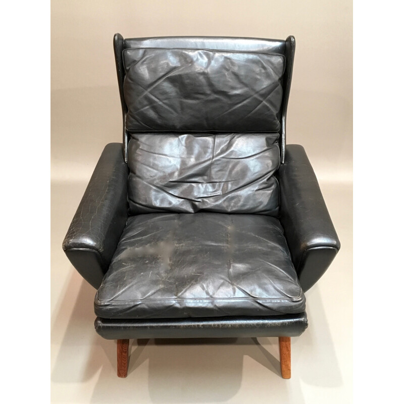 Rosewood and black leather Scandinavian armchair - 1950s