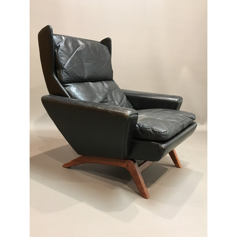 Rosewood and black leather Scandinavian armchair - 1950s