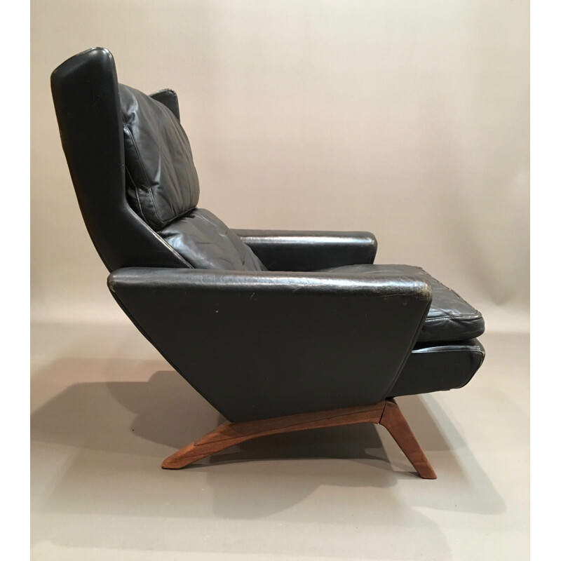 Rosewood and black leather Scandinavian armchair - 1950s