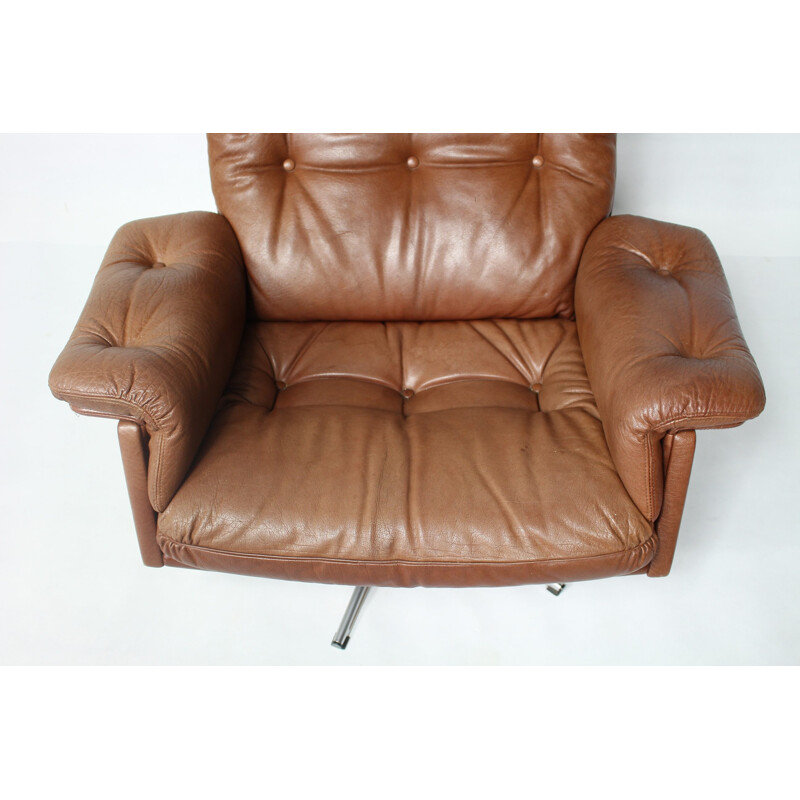 Vintage leather swivel armchair - 1960s