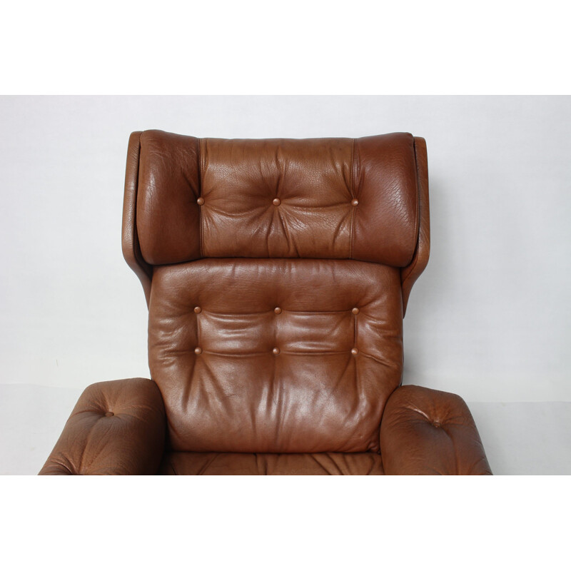 Vintage leather swivel armchair - 1960s