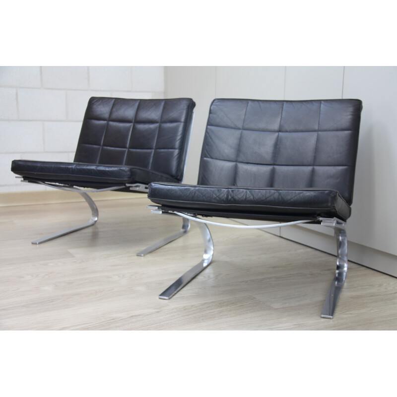 Pair of vintage black leather chairs produced by Girsberger - 1970s