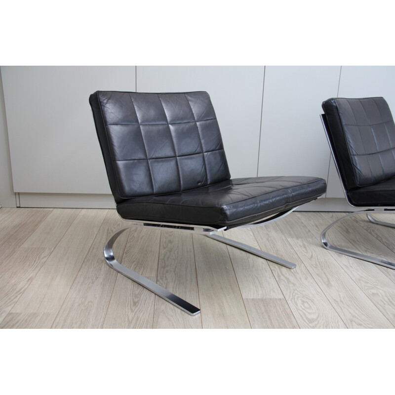 Pair of vintage black leather chairs produced by Girsberger - 1970s