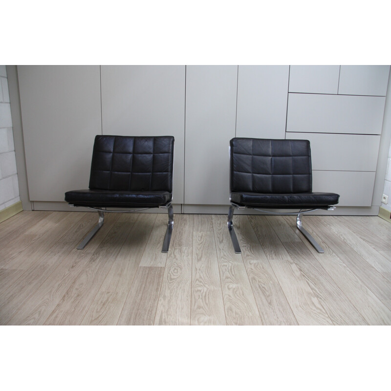 Pair of vintage black leather chairs produced by Girsberger - 1970s