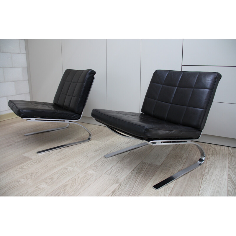 Pair of vintage black leather chairs produced by Girsberger - 1970s