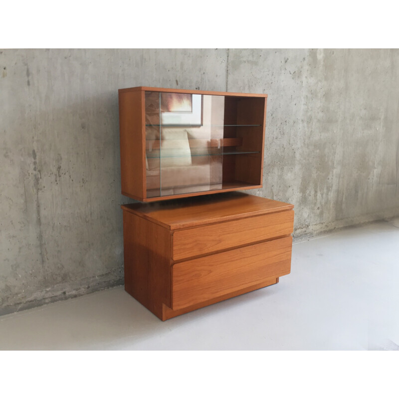 Chest of drawers and illuminated wall mounted display cabinet for Beaver and Tapley - 1970s