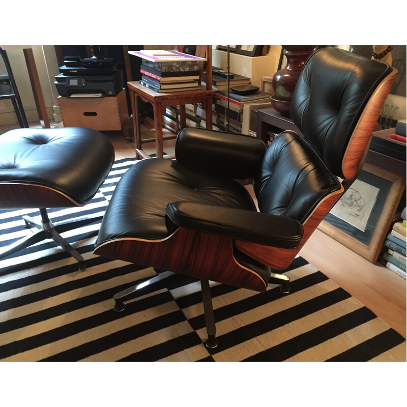 Fauteuil Lounge vintage et son Ottoman en palissandre et cuir noir d'Eames pour Herman Miller - 2000