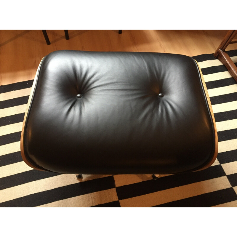 Fauteuil Lounge vintage et son Ottoman en palissandre et cuir noir d'Eames pour Herman Miller - 2000