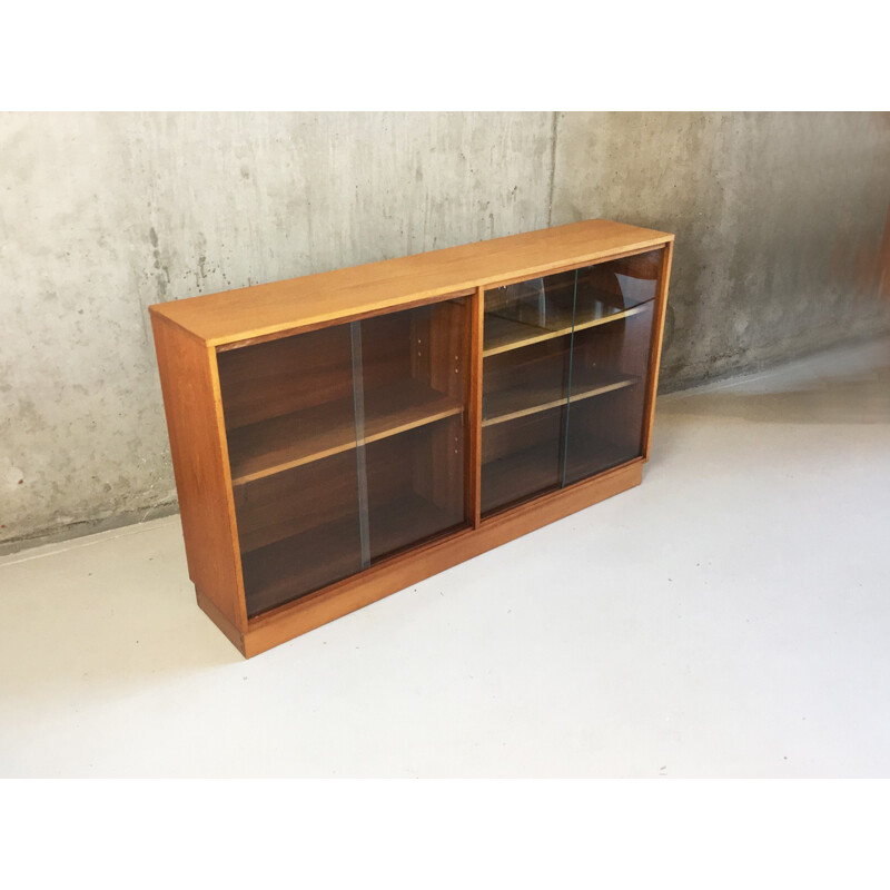 Beech long and low book case with glass sliding doors for Morris of Glasgow - 1970s