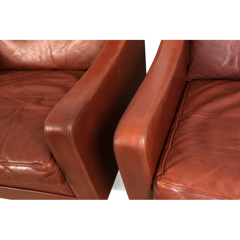 Pair of leather Danish armchairs - 1960s