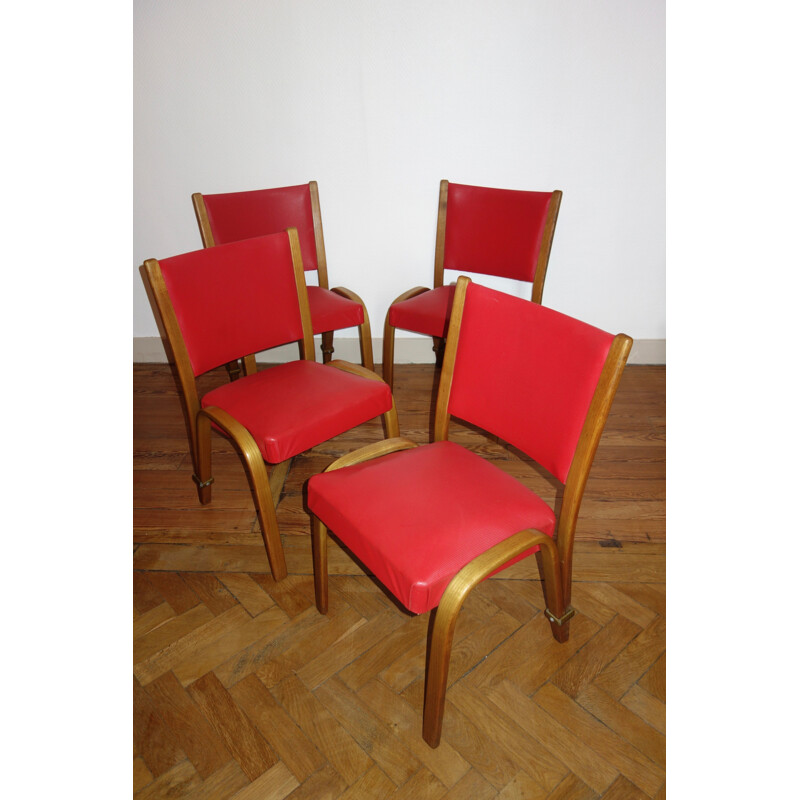 Suite de 4 chaises "Bow wood" par Hugues Steiner - 1950