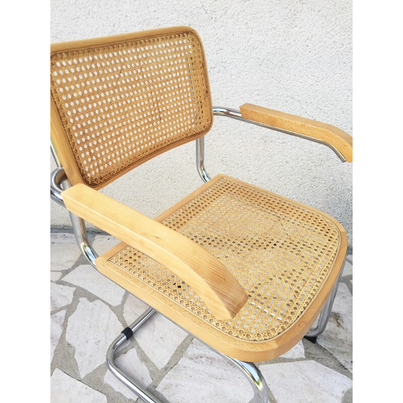 Fauteuil vintage avec dossier en acier et cannage - 1970