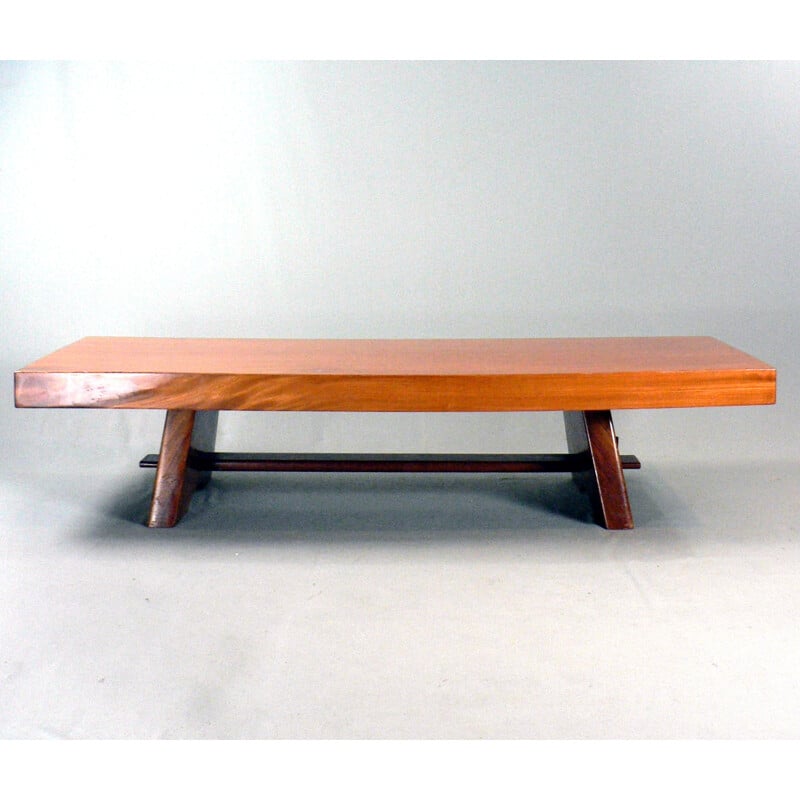 Table basse vintage en bois exotique massif et verni - 1950