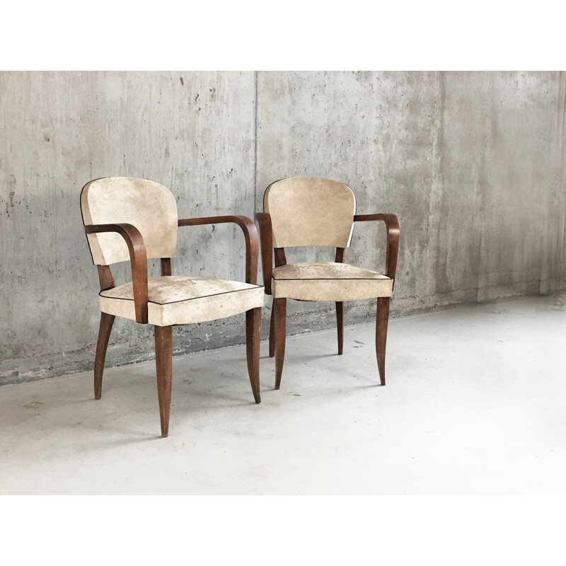 Pair of  white vinyl armchairs with sculpted oak frames - 1950s