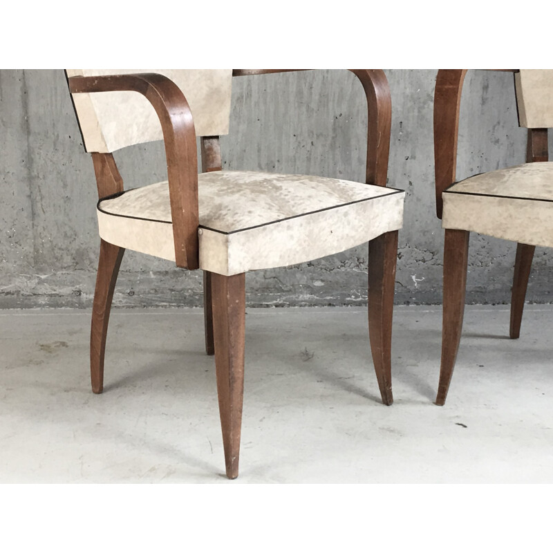 Pair of  white vinyl armchairs with sculpted oak frames - 1950s