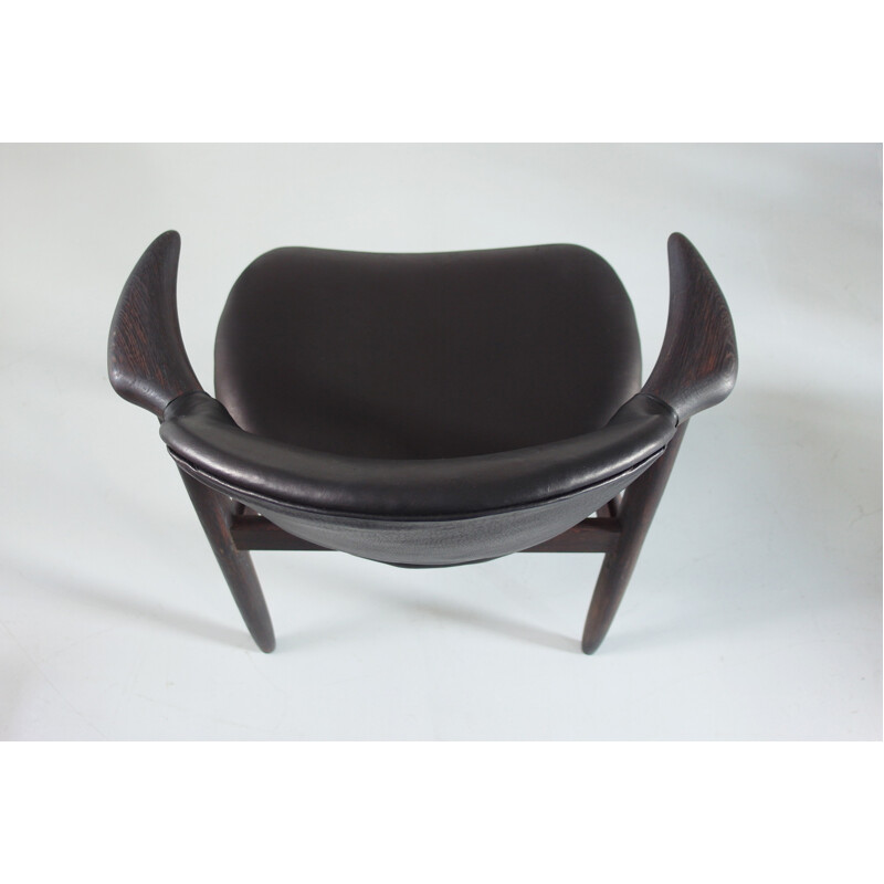Suite de quatre chaises Cowhorn en cuir noir par Tijsseling - 1950