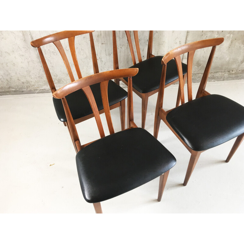 Set of 4 vintage teak and black vinyl dining chairs - 1970s