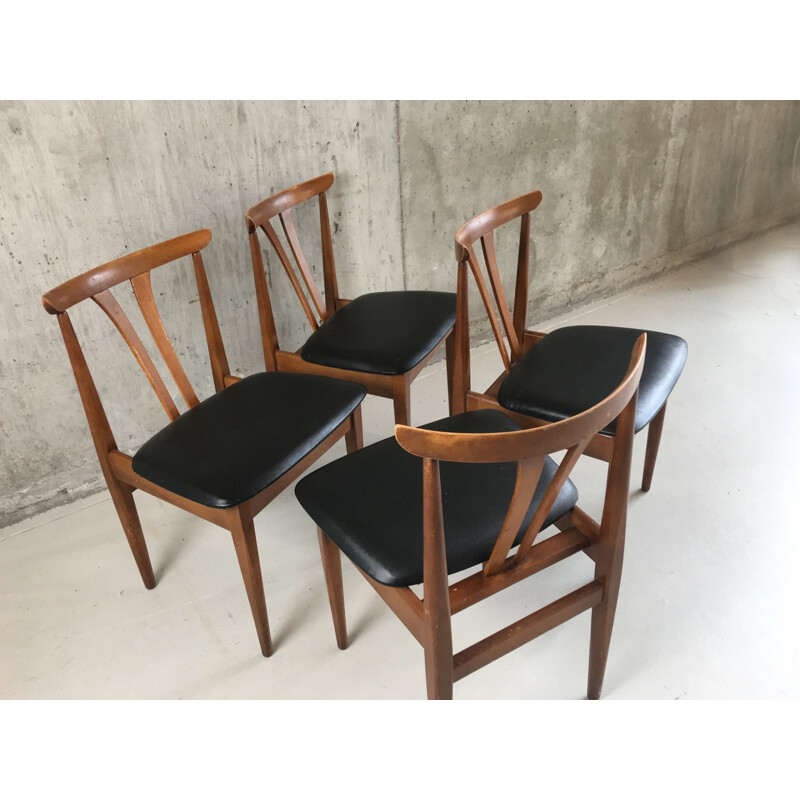 Set of 4 vintage teak and black vinyl dining chairs - 1970s