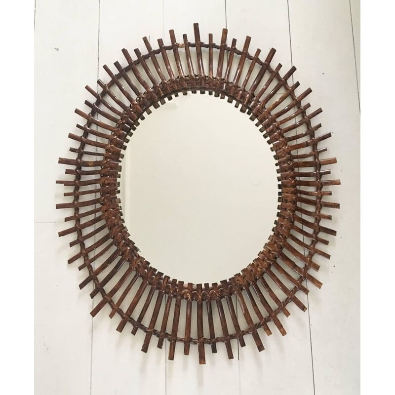 Vintage sunburst rattan oval mirror, Spain 1960