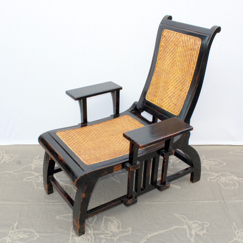 Long chair made of tinted wood and rattan - 1970s