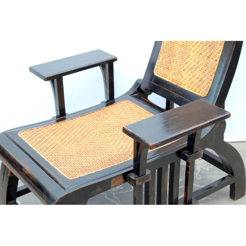 Long chair made of tinted wood and rattan - 1970s