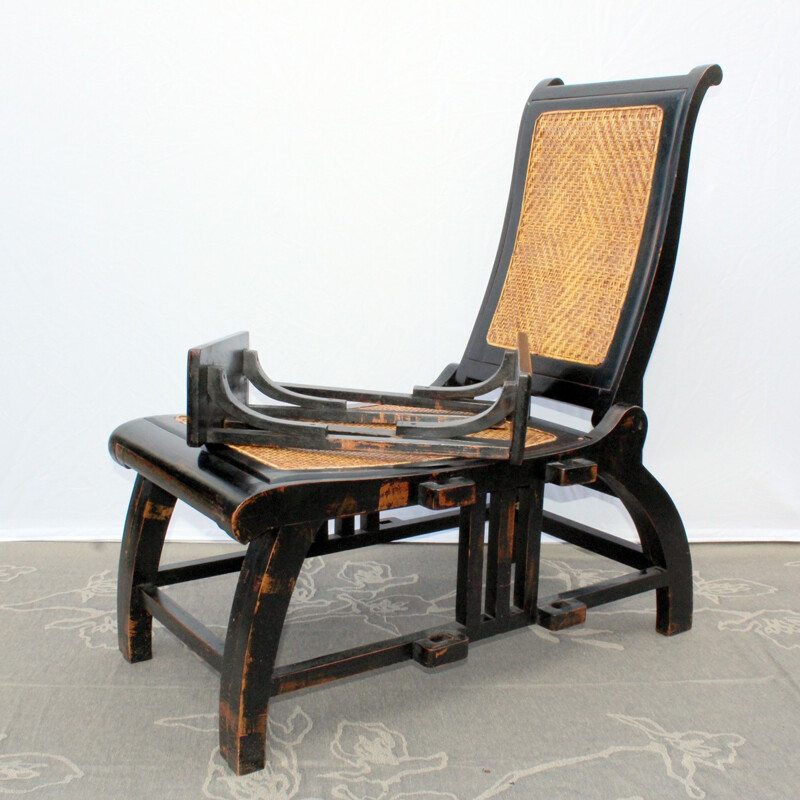 Long chair made of tinted wood and rattan - 1970s