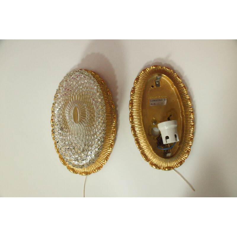 Pair of gold-colored crystal glass wall lights in oval shape - 1960s