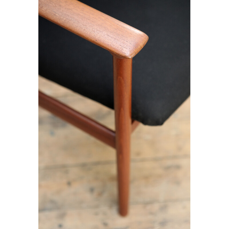 Vintage teak armchair in teak and black wool - 1960s