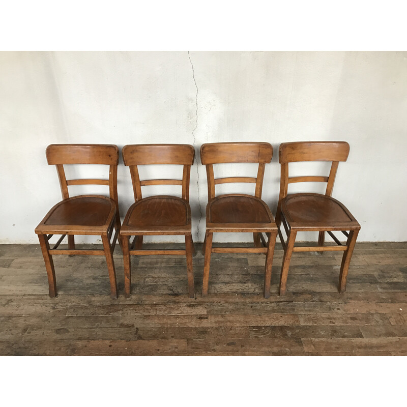 Suite de 180 chaises en bois - 1950