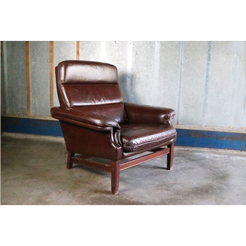 Vintage danish lounge chair with original leather upholstery