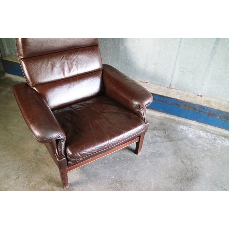 Vintage danish lounge chair with original leather upholstery