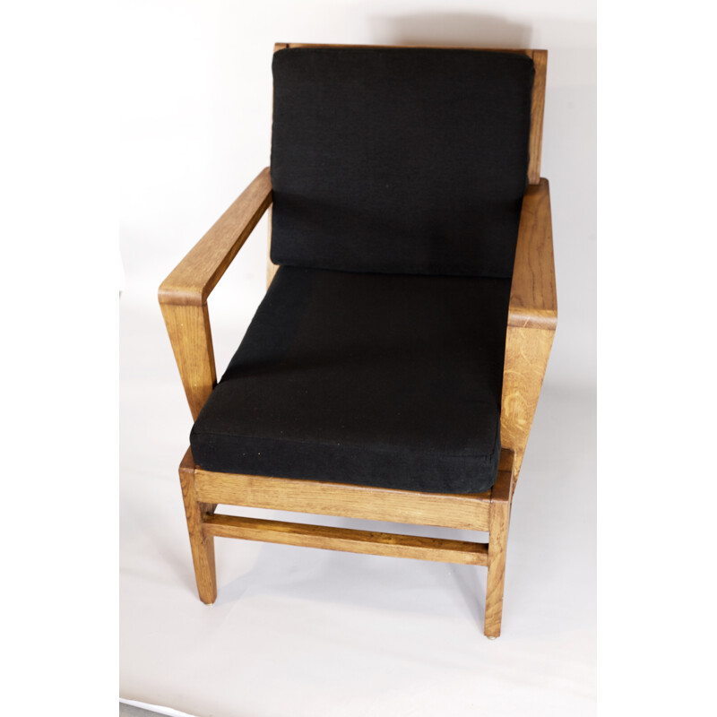 Large black armchair in Oak by René Gabriel - 1940s