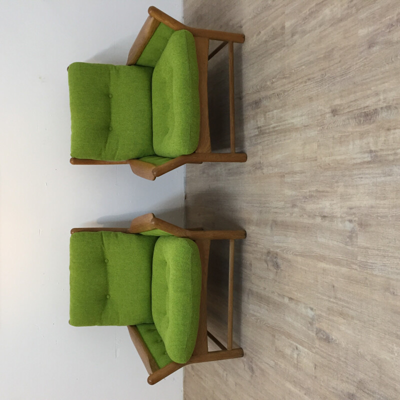 Pair of green armchairs in oakwood - 1970s