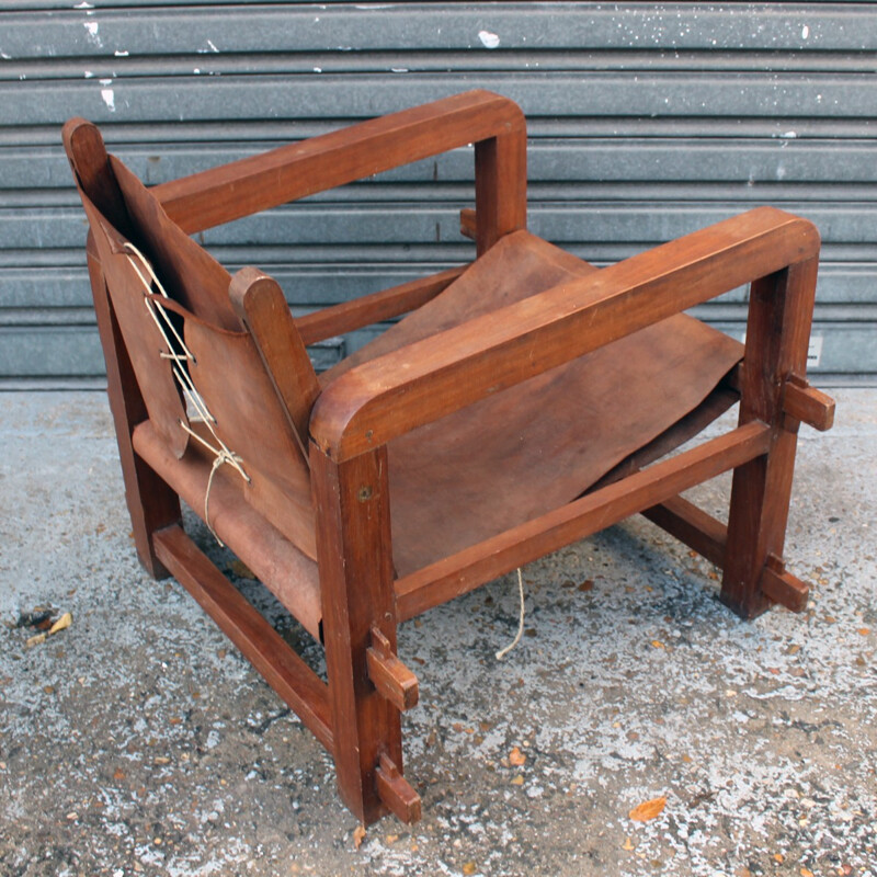 Set of 4 vintage armchairs in solid wood and cognac leather - 1950s