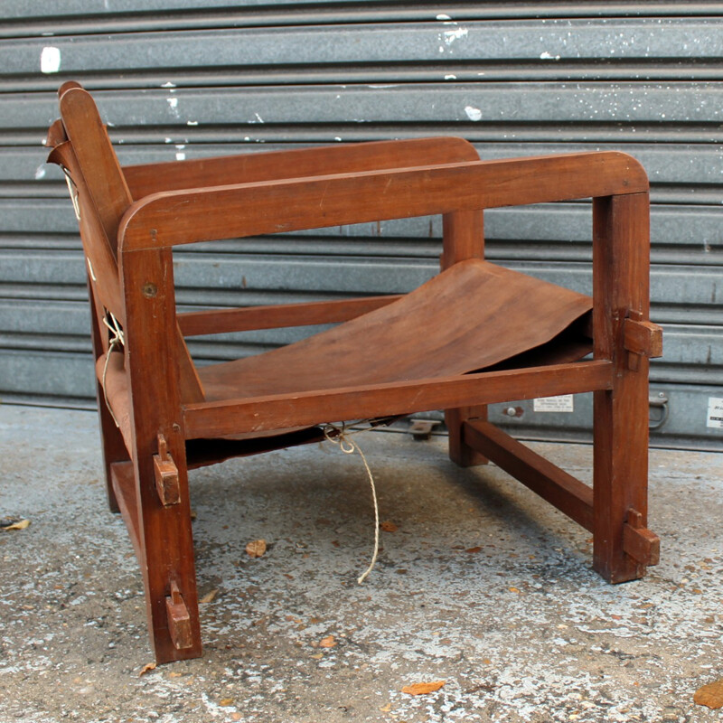 Suite de 4 fauteuils vintage en bois massif et en cuir cognac - 1950